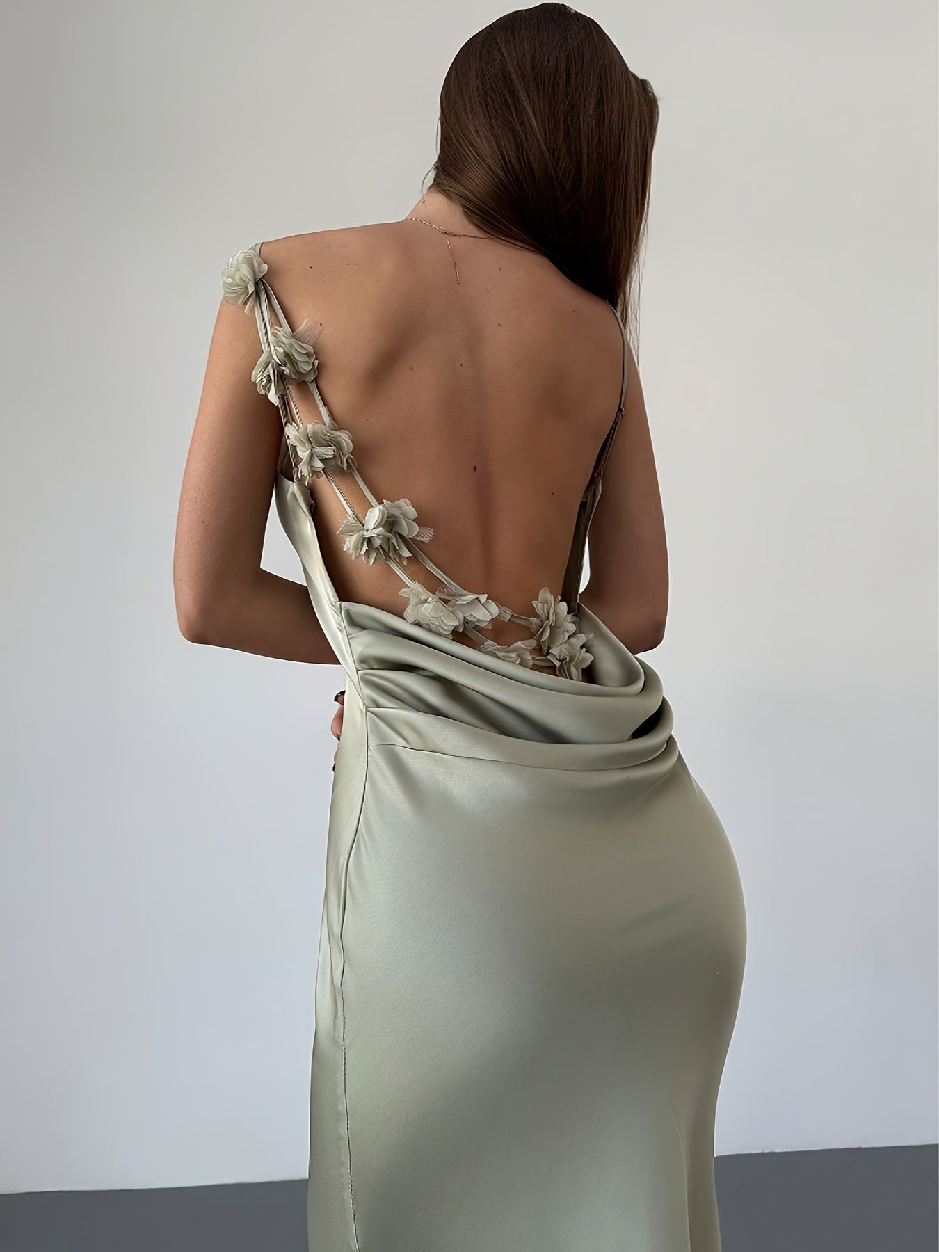 Elegant Backless Glossy Satin Maxi Dress with 3D Floral Detail - Draped Neck, Long Mermaid Hem, Sleeveless for Weddings, Parties & Dates, Light Green, A-Line Silhouette, Formal Evening Attire | Sleek Fitted Dress | Glossy Fab